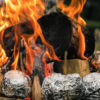 baked potatoes in foil in the campfire